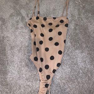 Tan bodysuit with black polka dots